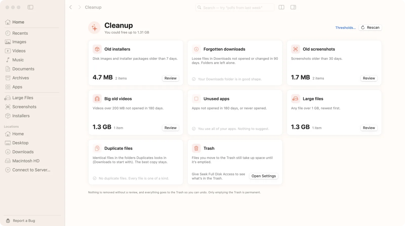 Seek's Cleanup screen showing old installers, forgotten downloads, old screenshots, big old videos, unused apps, large files, duplicate files and the Trash, with the space each would free